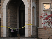 Investigators from the Peel Regional Police search for evidence at the scene of a home invasion in Brampton, Canada, on October 21, 2024. On...