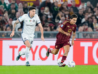 Paulo Dybala of AS Roma and Alessandro Bastoni of FC Internazionale during the Serie A Enilive match between AS Roma and FC Internazionale a...