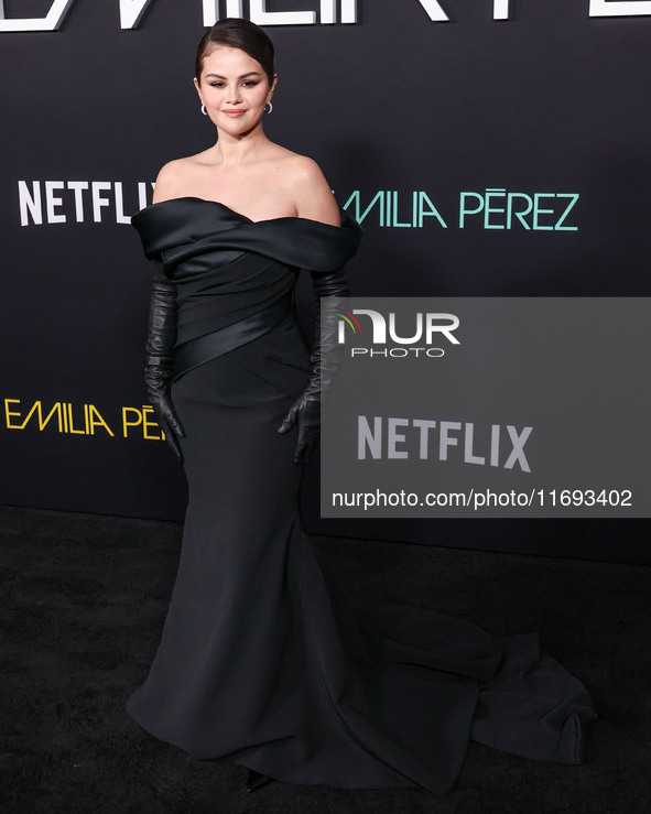 Selena Gomez wearing Elie Saab arrives at the Los Angeles Premiere of Netflix's 'Emilia Perez' held at The Egyptian Theatre Hollywood on Oct...