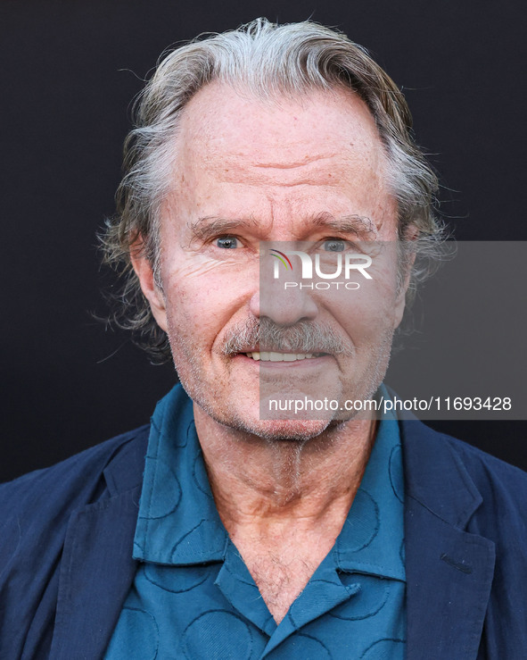 John Savage arrives at the Los Angeles Premiere of Netflix's 'Emilia Perez' held at The Egyptian Theatre Hollywood on October 21, 2024 in Ho...