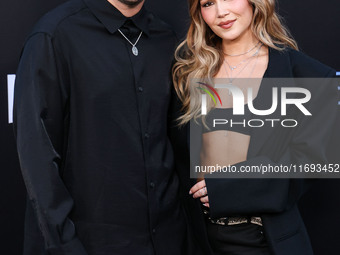 Tyler Wilson and Kelli Berglund arrive at the Los Angeles Premiere of Netflix's 'Emilia Perez' held at The Egyptian Theatre Hollywood on Oct...