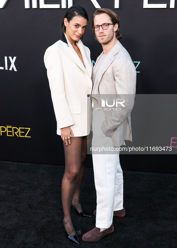 Laysla De Oliveira and Jonathan Keltz arrive at the Los Angeles Premiere of Netflix's 'Emilia Perez' held at The Egyptian Theatre Hollywood...