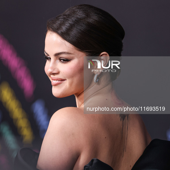 Selena Gomez wearing Elie Saab arrives at the Los Angeles Premiere of Netflix's 'Emilia Perez' held at The Egyptian Theatre Hollywood on Oct...