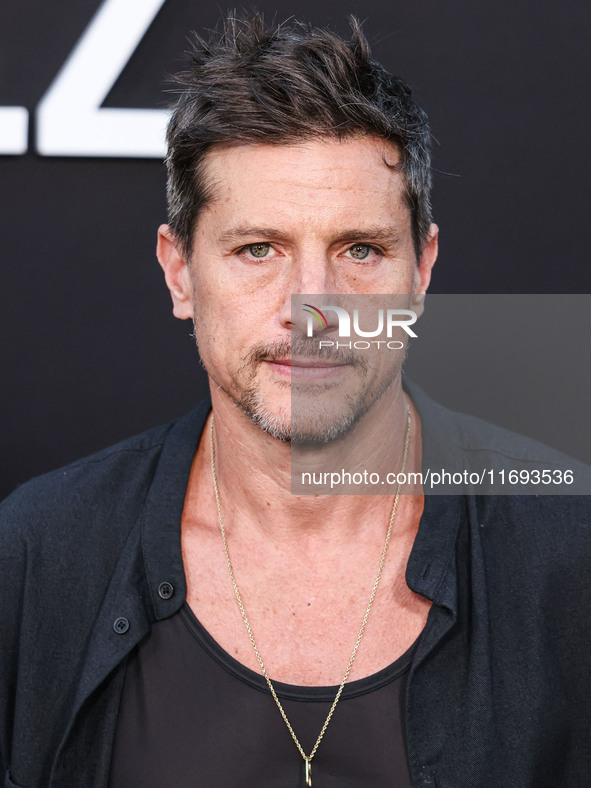 Simon Rex arrives at the Los Angeles Premiere of Netflix's 'Emilia Perez' held at The Egyptian Theatre Hollywood on October 21, 2024 in Holl...