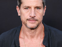 Simon Rex arrives at the Los Angeles Premiere of Netflix's 'Emilia Perez' held at The Egyptian Theatre Hollywood on October 21, 2024 in Holl...