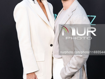 Laysla De Oliveira and Jonathan Keltz arrive at the Los Angeles Premiere of Netflix's 'Emilia Perez' held at The Egyptian Theatre Hollywood...