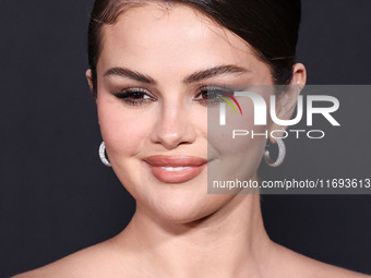 Selena Gomez wearing Elie Saab arrives at the Los Angeles Premiere of Netflix's 'Emilia Perez' held at The Egyptian Theatre Hollywood on Oct...