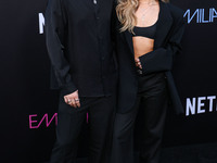 Tyler Wilson and Kelli Berglund arrive at the Los Angeles Premiere of Netflix's 'Emilia Perez' held at The Egyptian Theatre Hollywood on Oct...