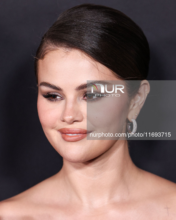 Selena Gomez wearing Elie Saab arrives at the Los Angeles Premiere of Netflix's 'Emilia Perez' held at The Egyptian Theatre Hollywood on Oct...