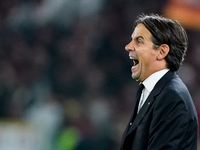 Simone Inzaghi head coach of FC Internazionale yells during the Serie A Enilive match between AS Roma and FC Internazionale at Stadio Olimpi...