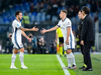 Hakan Calhanoglu of FC Internazionale leaves the pitch injured during the Serie A Enilive match between AS Roma and FC Internazionale at Sta...