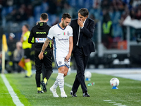 Simone Inzaghi head coach of FC Internazionale and Hakan Calhanoglu of FC Internazionale during the Serie A Enilive match between AS Roma an...