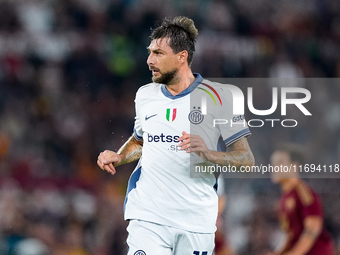 Francesco Acerbi of FC Internazionale looks on during the Serie A Enilive match between AS Roma and FC Internazionale at Stadio Olimpico on...