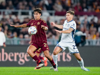 Nicolo' Barella of FC Internazionale and Paulo Dybala of AS Roma compete for the ball during the Serie A Enilive match between AS Roma and F...