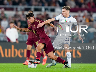 Paulo Dybala of AS Roma and Nicolo' Barella of FC Internazionale compete for the ball during the Serie A Enilive match between AS Roma and F...