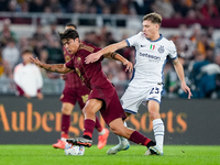 Paulo Dybala of AS Roma and Nicolo' Barella of FC Internazionale compete for the ball during the Serie A Enilive match between AS Roma and F...