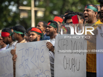 Civil society and students stage a demonstration at the Central Shaheed Minar, demanding the ban of Bangladesh Chhatra League and the resign...