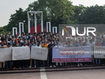 Civil society and students stage a demonstration at the Central Shaheed Minar, demanding the ban of Bangladesh Chhatra League and the resign...