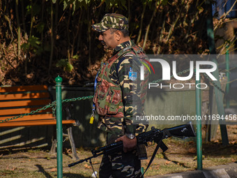 A security personnel stands guard in Srinagar, Jammu and Kashmir, on October 22, 2024. Security forces are on high alert after a recent mili...