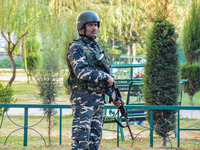 A security personnel stands guard in Srinagar, Jammu and Kashmir, on October 22, 2024. Security forces are on high alert after a recent mili...