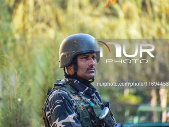 A security personnel stands guard in Srinagar, Jammu and Kashmir, on October 22, 2024. Security forces are on high alert after a recent mili...