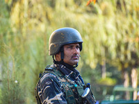 A security personnel stands guard in Srinagar, Jammu and Kashmir, on October 22, 2024. Security forces are on high alert after a recent mili...