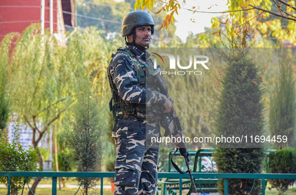 A security personnel stands guard in Srinagar, Jammu and Kashmir, on October 22, 2024. Security forces are on high alert after a recent mili...