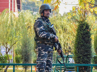 A security personnel stands guard in Srinagar, Jammu and Kashmir, on October 22, 2024. Security forces are on high alert after a recent mili...