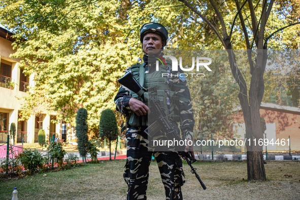 A security personnel stands guard in Srinagar, Jammu and Kashmir, on October 22, 2024. Security forces are on high alert after a recent mili...