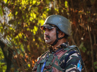 A security personnel stands guard in Srinagar, Jammu and Kashmir, on October 22, 2024. Security forces are on high alert after a recent mili...