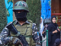 A security personnel stands guard in Srinagar, Jammu and Kashmir, on October 22, 2024. Security forces are on high alert after a recent mili...