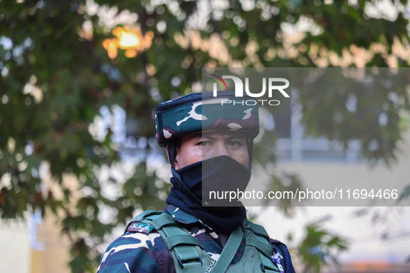 A security personnel stands guard in Srinagar, Jammu and Kashmir, on October 22, 2024. Security forces are on high alert after a recent mili...