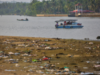 Trash and filth cover Paruthiyoor Beach in Paruthiyoor, Kerala, India, on April 15, 2024. (