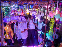 People buy decorative lights ahead of the Diwali festival celebration in Kolkata, India, on October 22, 2024. (