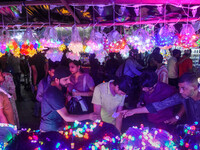 People buy decorative lights ahead of the Diwali festival celebration in Kolkata, India, on October 22, 2024. (