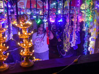 People buy decorative lights ahead of the Diwali festival celebration in Kolkata, India, on October 22, 2024. (