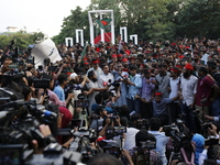 Anti-Discrimination students participate in a protest demanding President Mohammed Shahabuddin step down over his comment about the resignat...