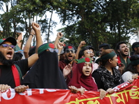 Anti-Discrimination students participate in a protest demanding President Mohammed Shahabuddin step down over his comment about the resignat...