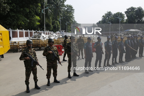 Bangladesh army personnel stand guard in front of Bangabhaban in Dhaka, Bangladesh, on October 22, 2024. 