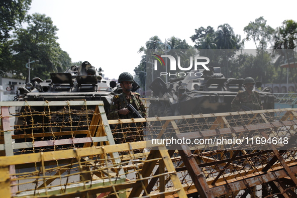 Bangladesh army personnel stand guard in front of Bangabhaban in Dhaka, Bangladesh, on October 22, 2024. 