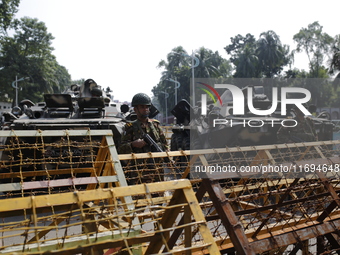 Bangladesh army personnel stand guard in front of Bangabhaban in Dhaka, Bangladesh, on October 22, 2024. (