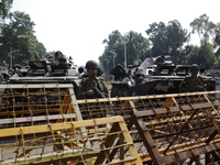 Bangladesh army personnel stand guard in front of Bangabhaban in Dhaka, Bangladesh, on October 22, 2024. (