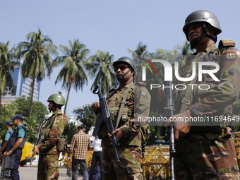 Bangladesh army personnel stand guard in front of Bangabhaban in Dhaka, Bangladesh, on October 22, 2024. (