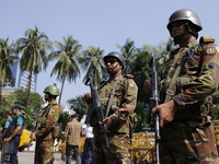 Bangladesh army personnel stand guard in front of Bangabhaban in Dhaka, Bangladesh, on October 22, 2024. (