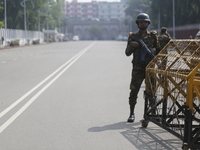 Bangladesh army personnel stand guard in front of Bangabhaban in Dhaka, Bangladesh, on October 22, 2024. (