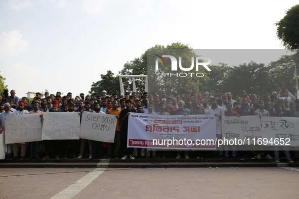 Anti-Discrimination students participate in a protest demanding President Mohammed Shahabuddin step down over his comment about the resignat...