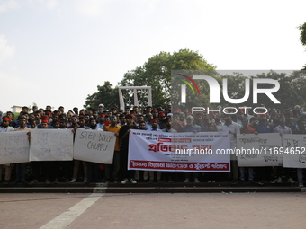 Anti-Discrimination students participate in a protest demanding President Mohammed Shahabuddin step down over his comment about the resignat...