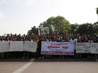 Anti-Discrimination students participate in a protest demanding President Mohammed Shahabuddin step down over his comment about the resignat...