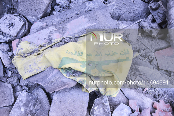 Civilians, paramedics, and Civil Defense Search and Rescue teams conduct search and rescue operations among the rubble of collapsed building...