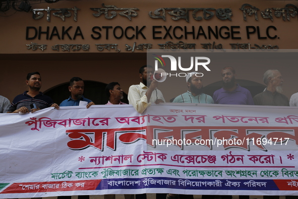 Capital market investors participate in a protest against the fall in stock prices over the past weeks in Dhaka, Bangladesh, on October 22,...